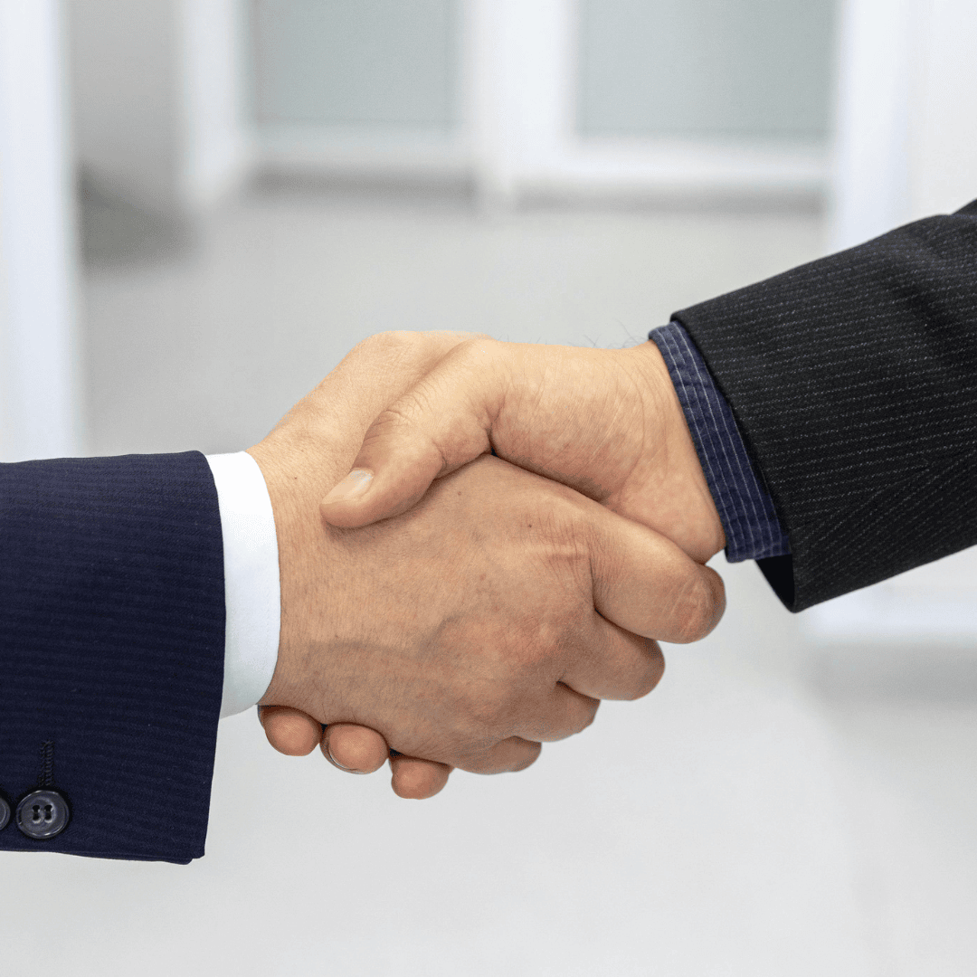 Handshake partnership symbolizing Agamin AI office automation solutions